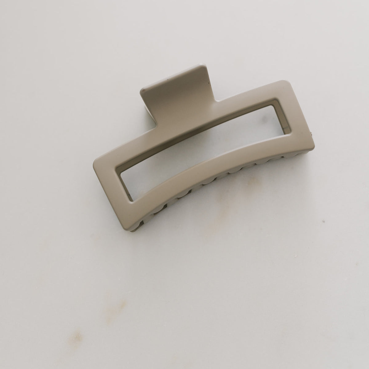 Taupe XL Cozy claw clip on white marble