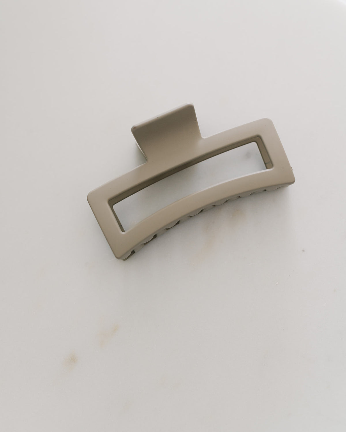 Taupe XL Cozy claw clip on white marble