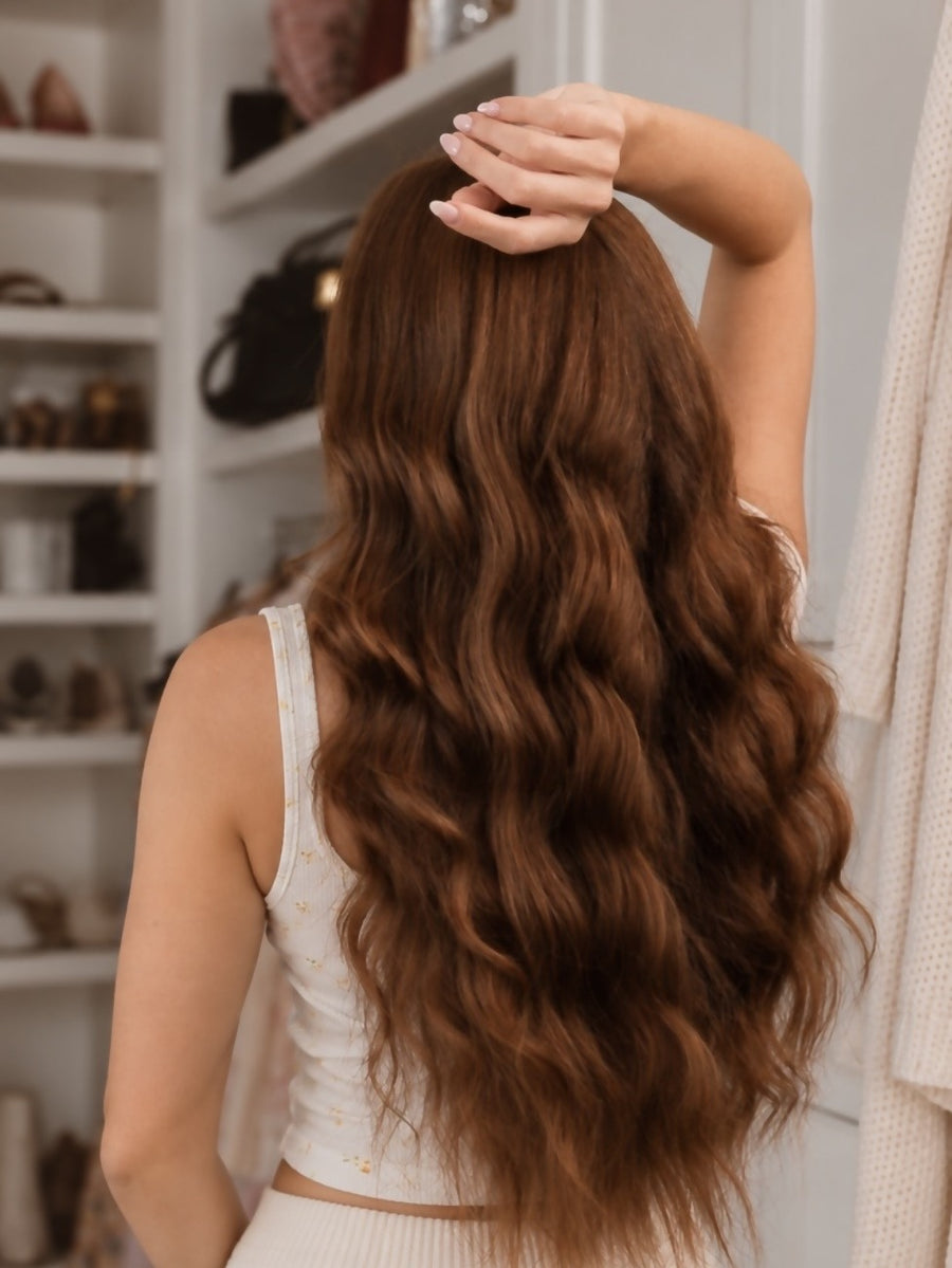 Long auburn curls from behind after the Classic CurlBand