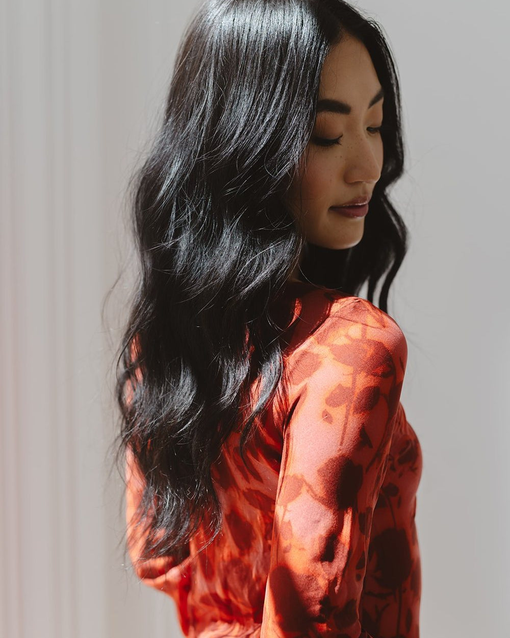 Back view of long dark heatless curls from the Classic CurlBand