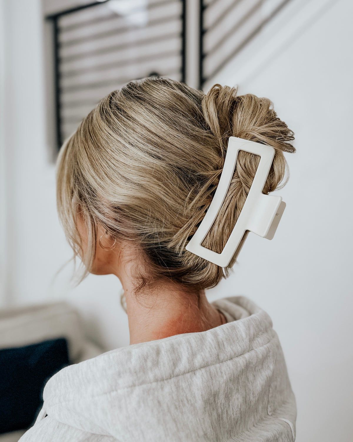 Ivory XL Cozy claw clip in a twisted blonde updo, side view