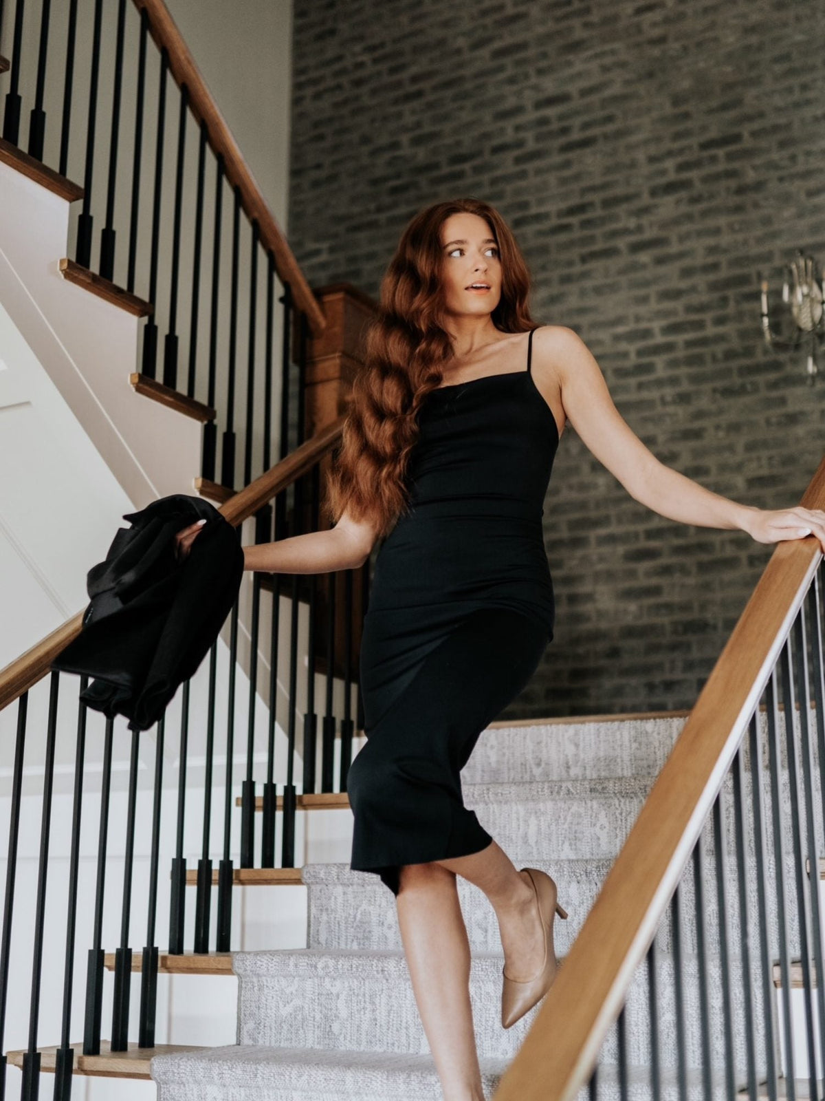 Elisabeth's long, voluminous thick red curls after a criss-cross CurlBand wrap