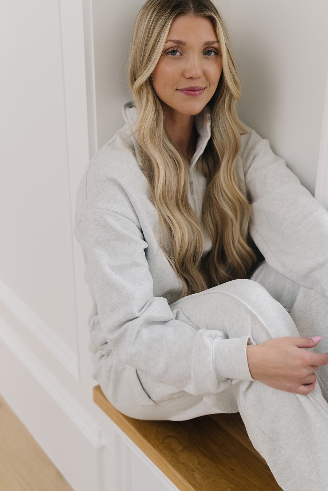 Heatless curls relaxed into soft waves on long blonde hair