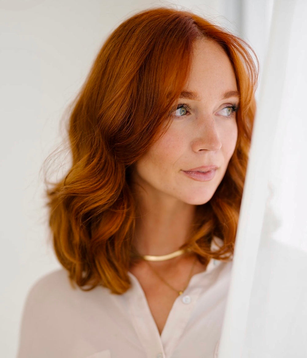 Red hair in big, bouncy blowout curls from the Blowout CurlBand
