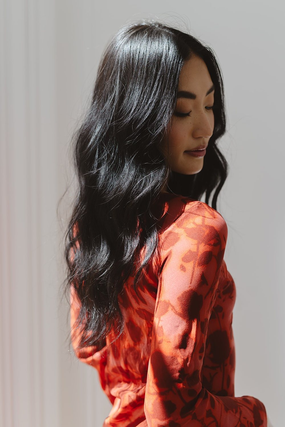 Back view of long dark heatless curls from the Classic CurlBand