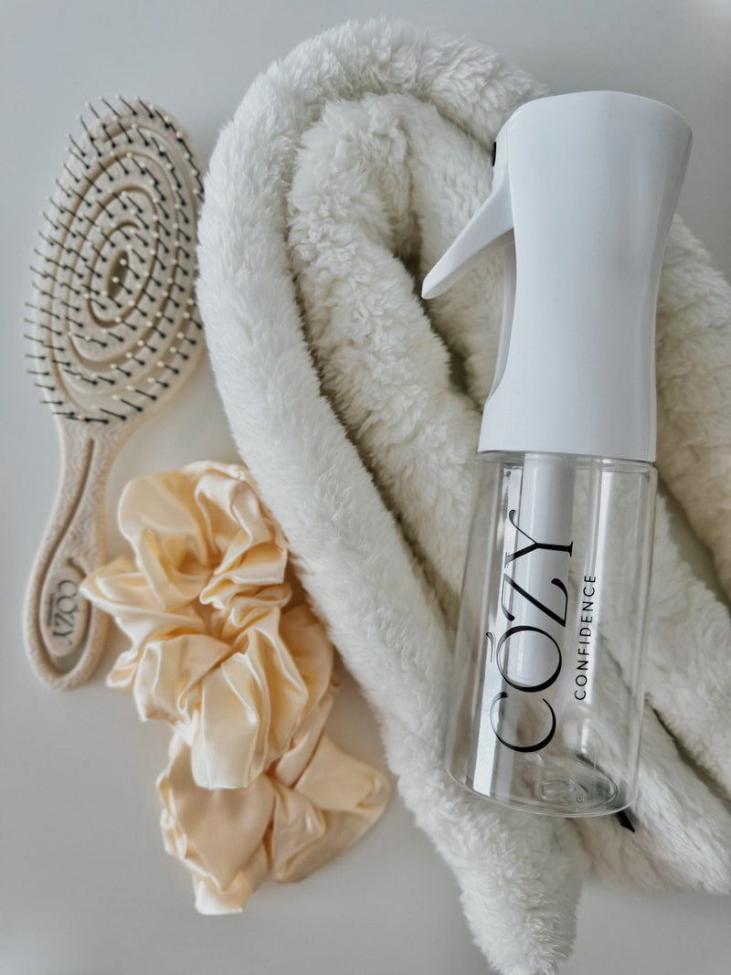 Cream Curl Kit for heatless curls with a white fluffy CurlBand, buttercream silk scrunchies, beige Volume Brush and white Cozy Confidence spray bottle